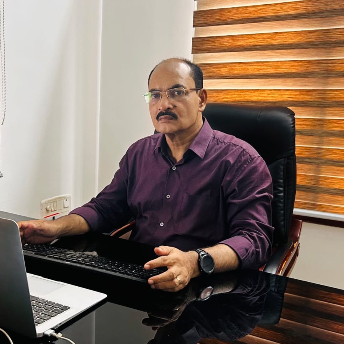 M K Mathew
